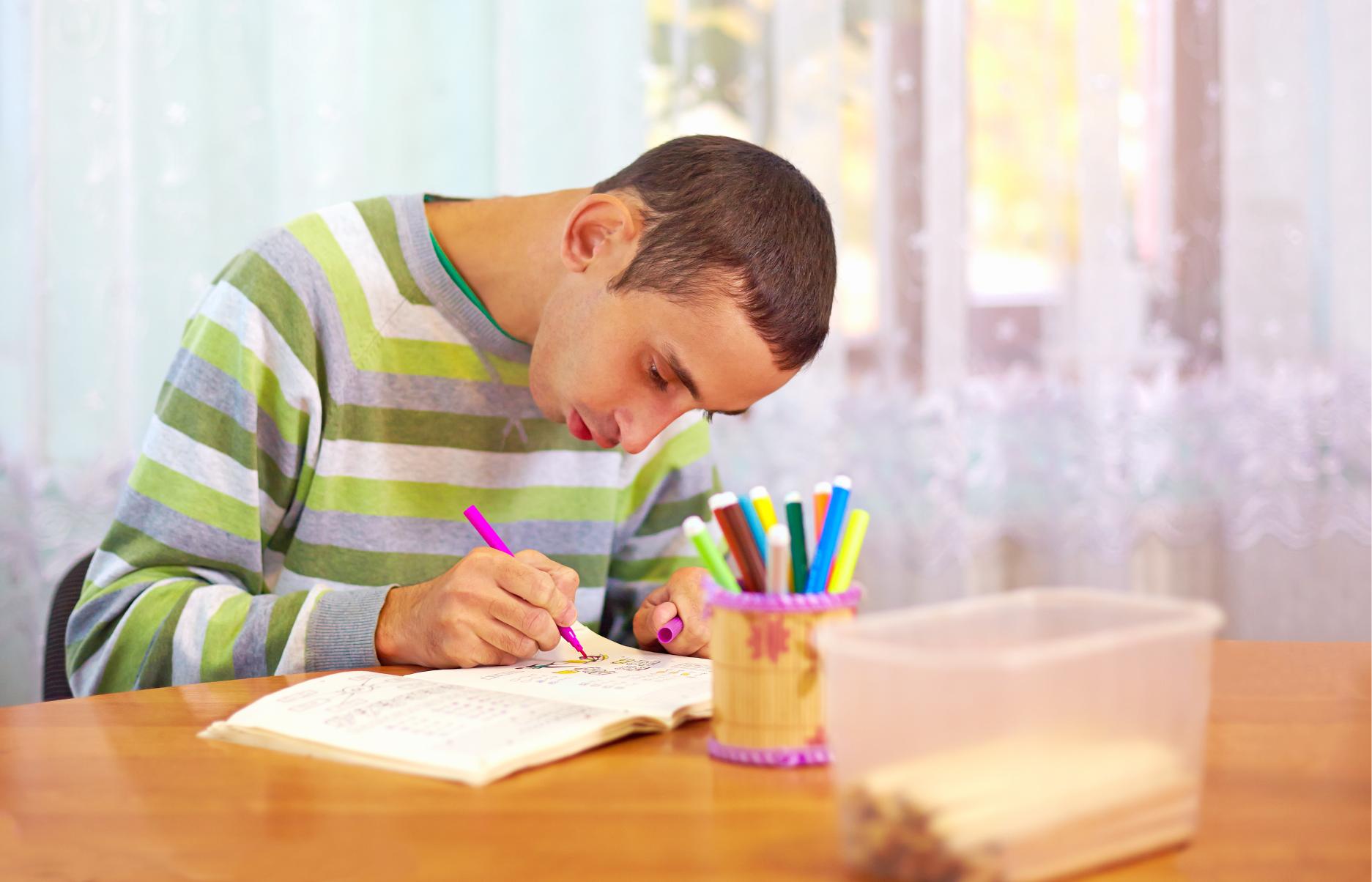 Child with tailored assistance needs writing